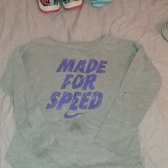 A Nike long sleeve t-shirt and star tights - Picture 1 of 2